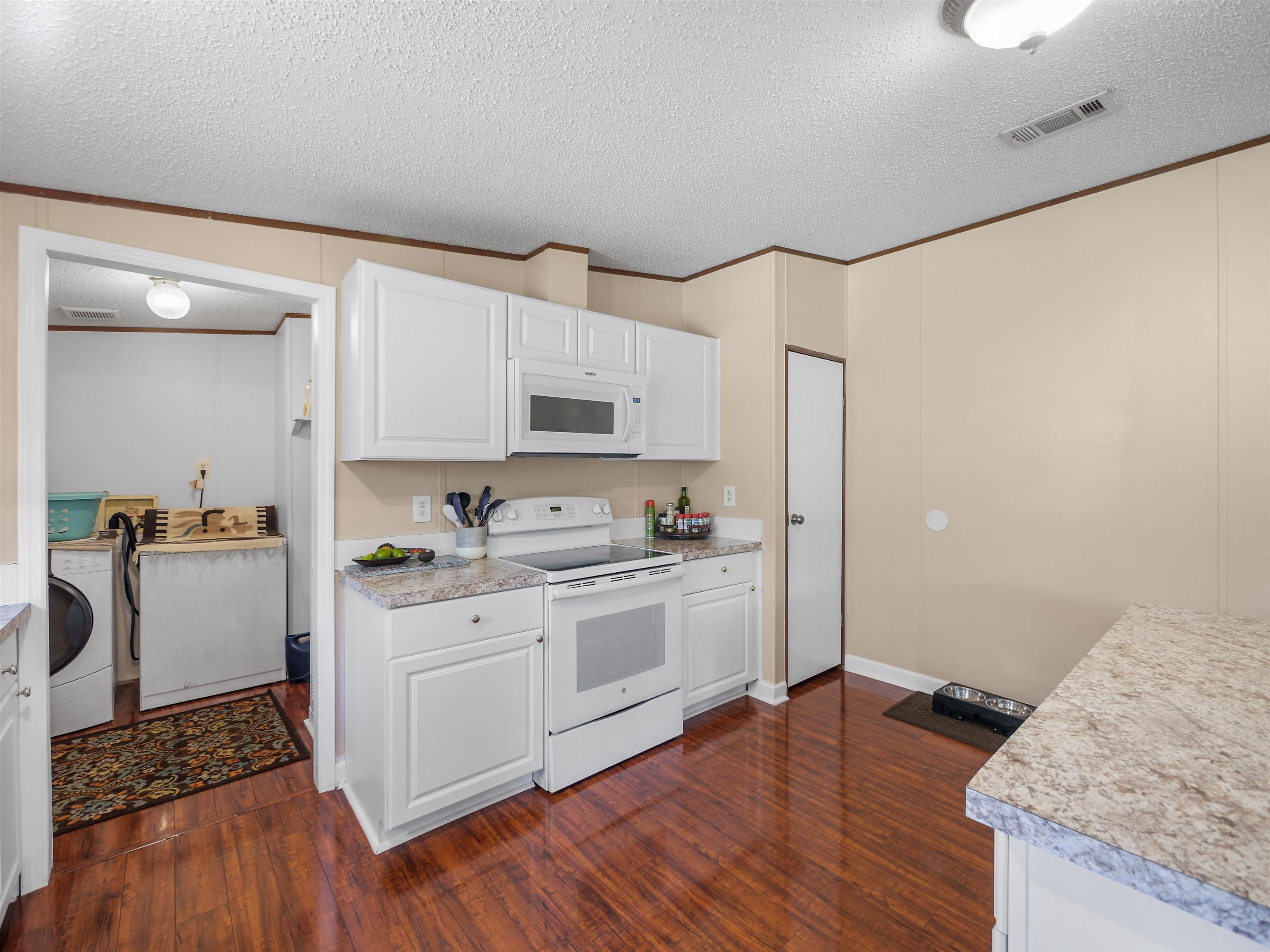 2961 Race Track Road St. Augustine, FL 32084 - Photo 12 of 42 a kitchen with stainless steel appliances a stove top oven a sink and cabinets