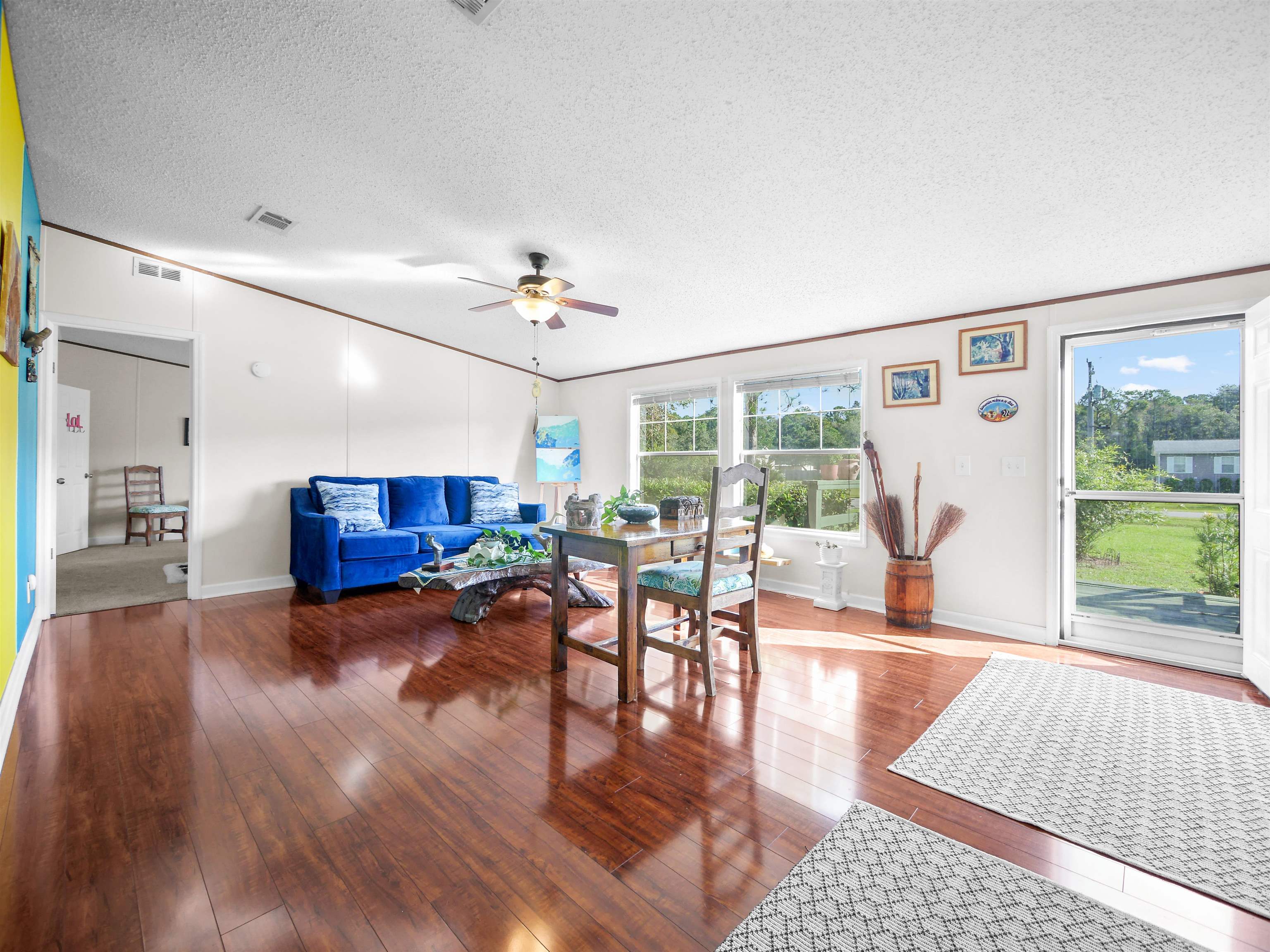 2961 Race Track Road St. Augustine, FL 32084 - Photo 3 of 42 a living room with furniture and a large window