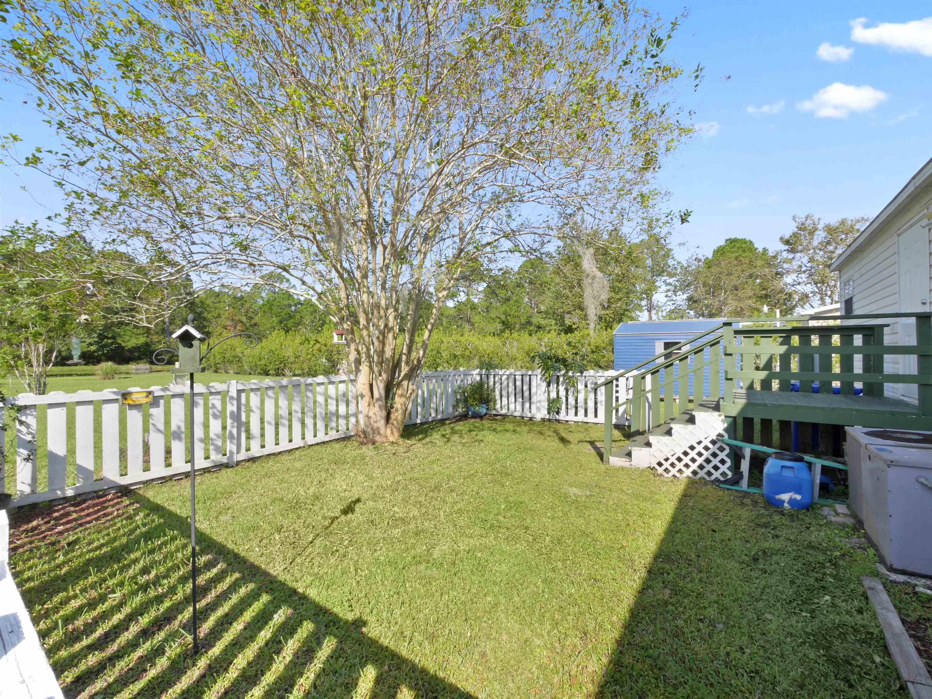 2961 Race Track Road St. Augustine, FL 32084 - Photo 31 of 42 a view of a deck with a big yard