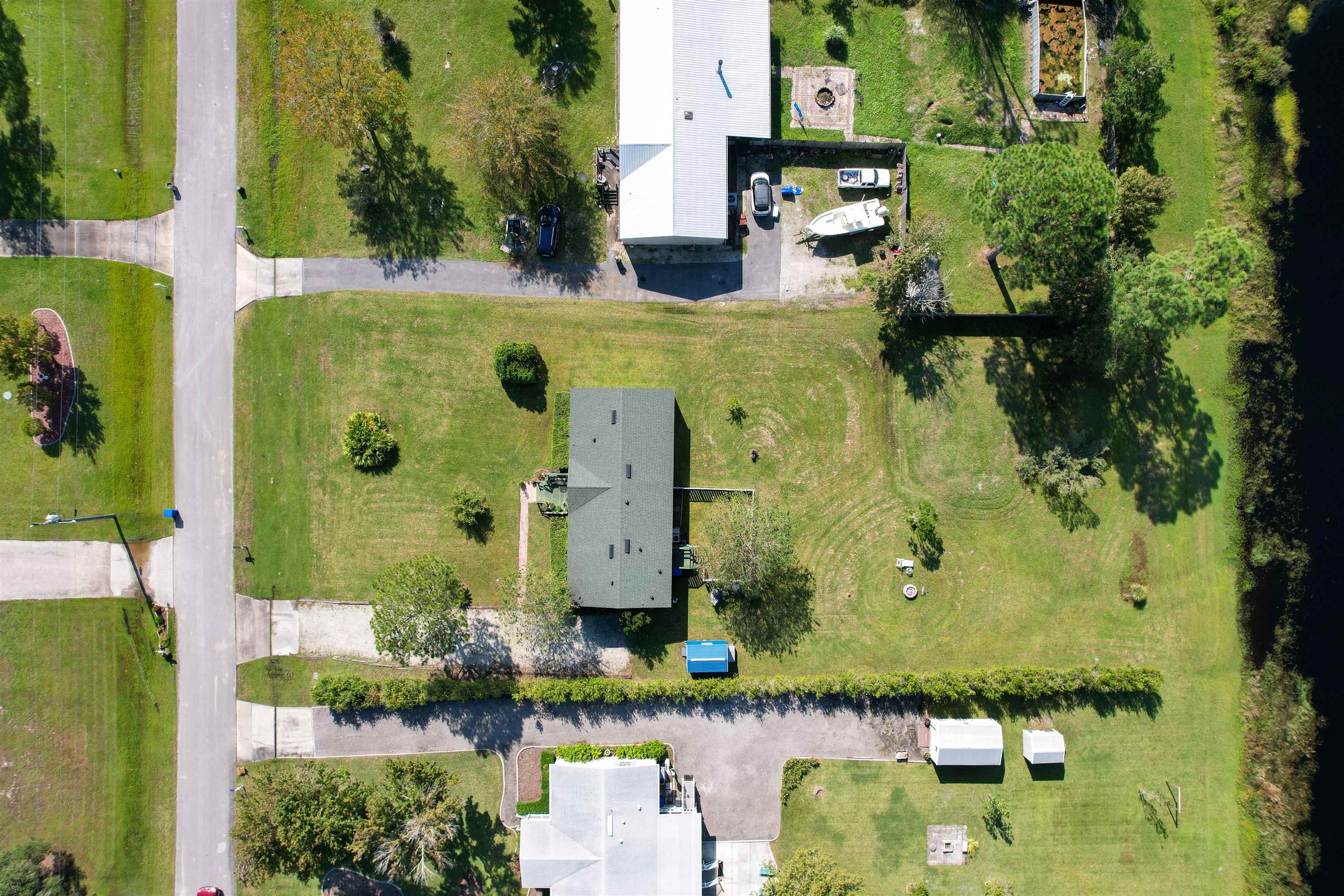 2961 Race Track Road St. Augustine, FL 32084 - Photo 40 of 42 an aerial view of residential houses with outdoor space