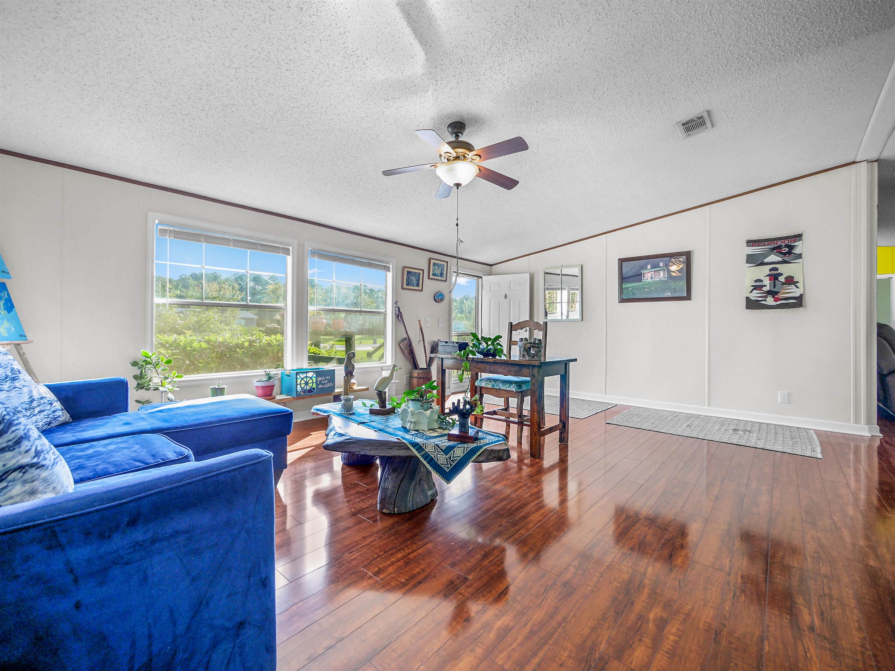 2961 Race Track Road St. Augustine, FL 32084 - Photo 4 of 42 a living room with furniture and a large window