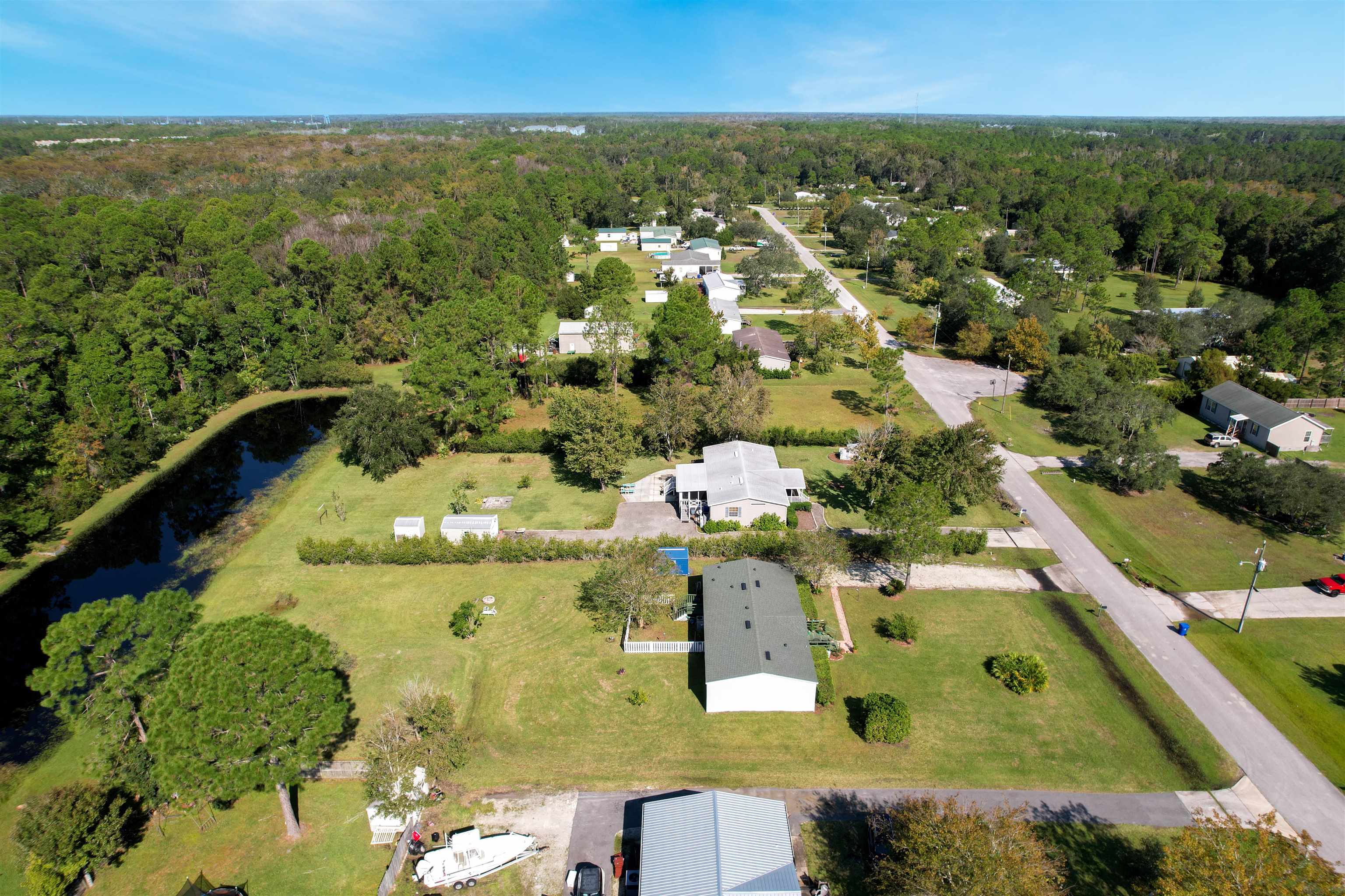 2961 Race Track Road St. Augustine, FL 32084 - Photo 41 of 42 an aerial view of residential house with outdoor space