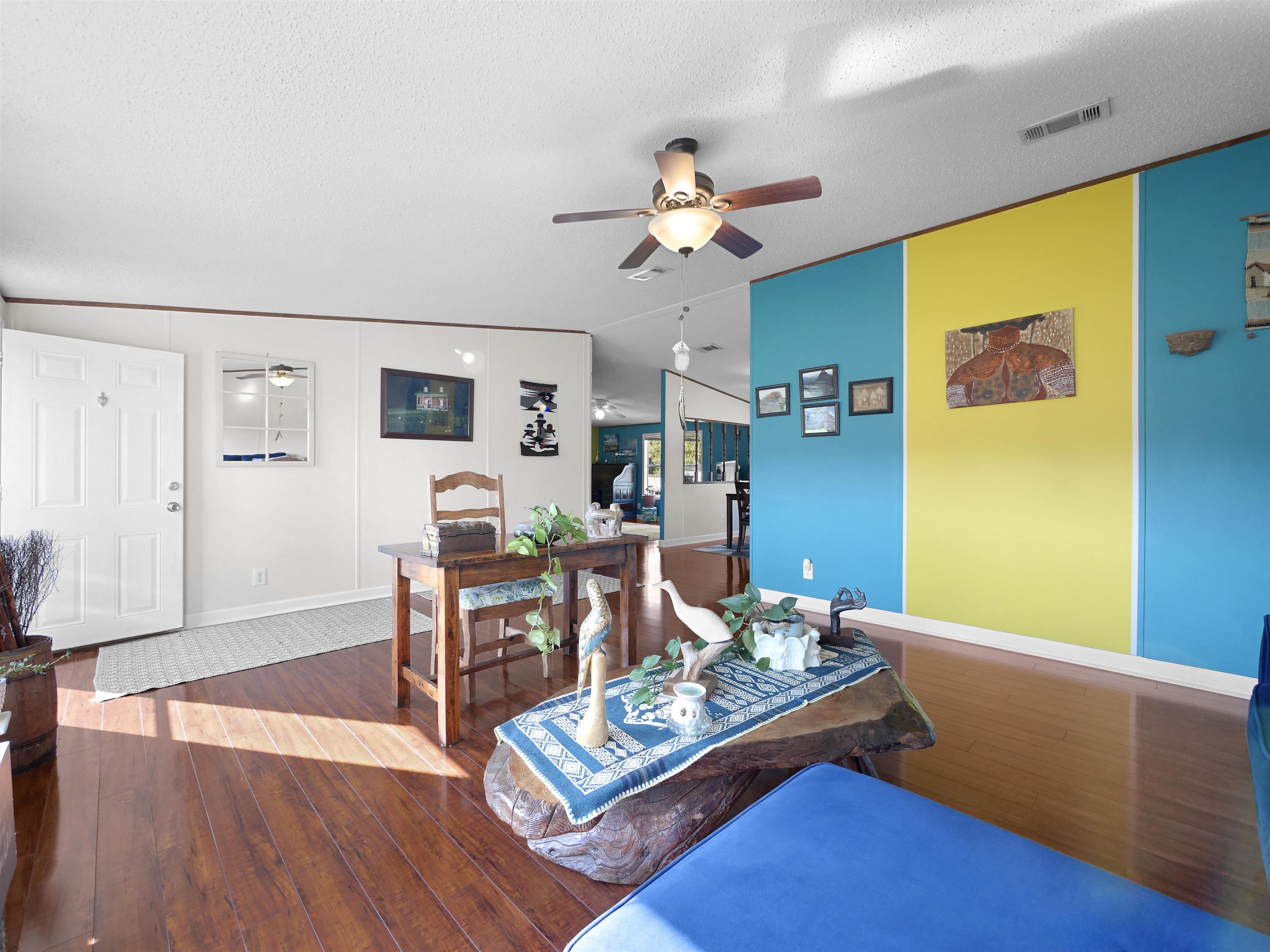 2961 Race Track Road St. Augustine, FL 32084 - Photo 5 of 42 a living room with furniture and a wooden floor