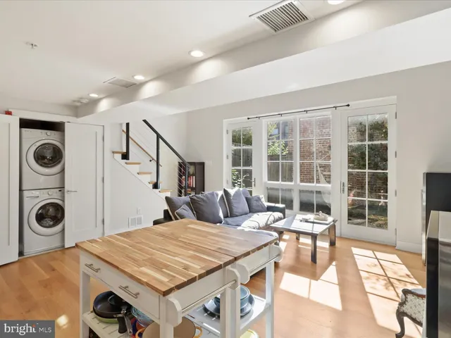a very nice looking dining room with a table and chairs