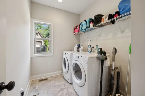 a view of a town with mountains in the background