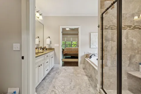 a room with a bed and a chair