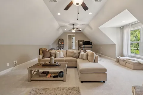 a aerial view of a house with a yard