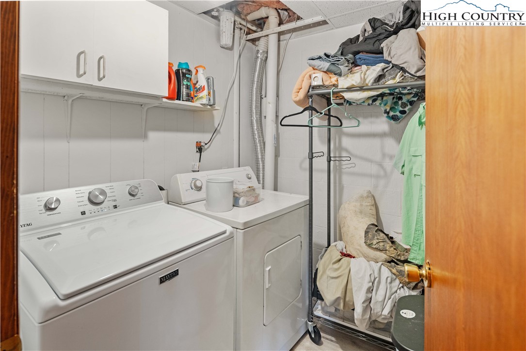 178 Green Knob Mountain Road Boone, NC 28607 - Photo 25 of 49 a utility room with dryer and washer