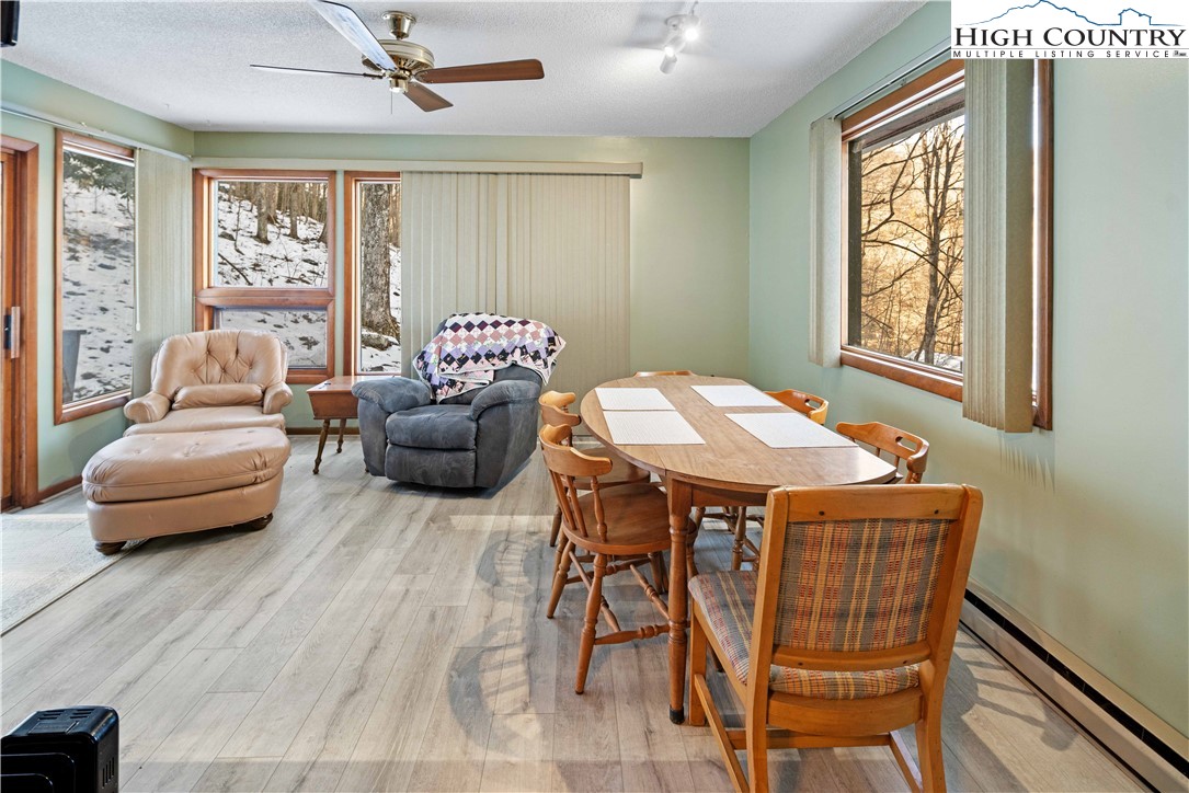 178 Green Knob Mountain Road Boone, NC 28607 - Photo 28 of 49 a living room with furniture and a window