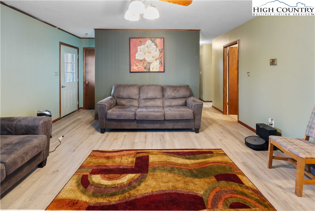 178 Green Knob Mountain Road Boone, NC 28607 - Photo 33 of 49 a living room with furniture and a couch