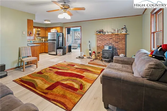 a room with two bed and a flat screen tv