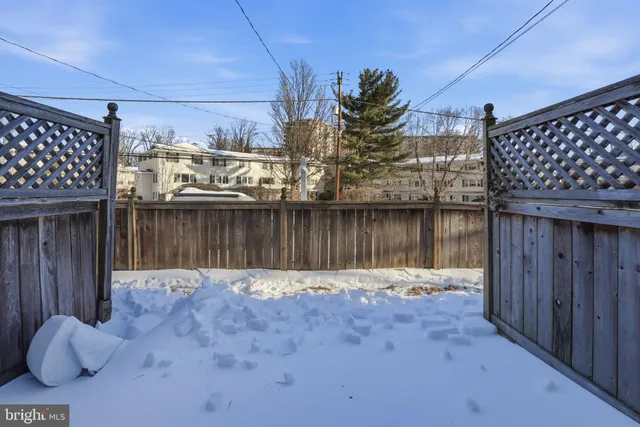 a view of a balcony with wooden floor