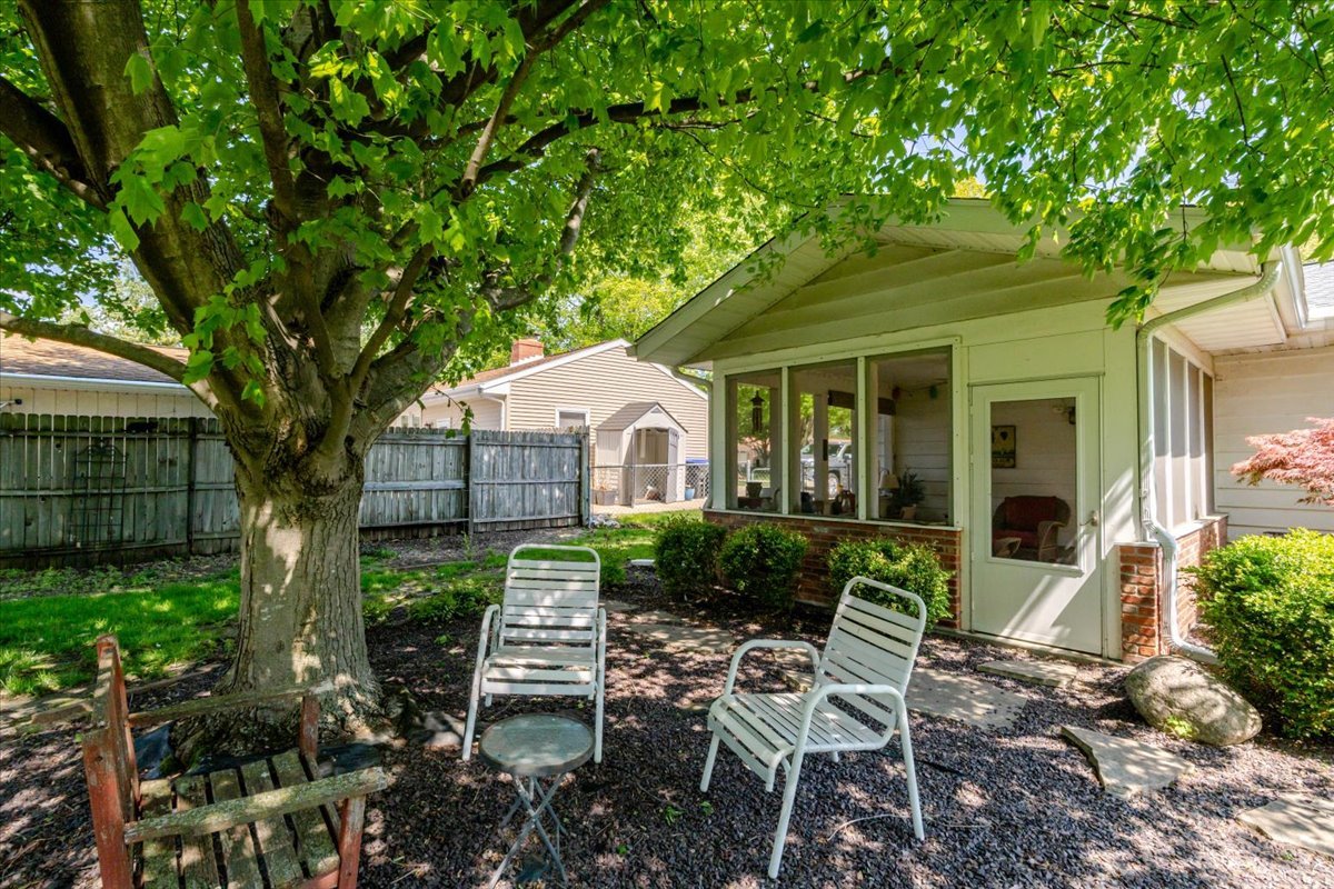 302 Radliff Road Bloomington, IL 61701 - Photo 4 of 35 a view of house with backyard and sitting area