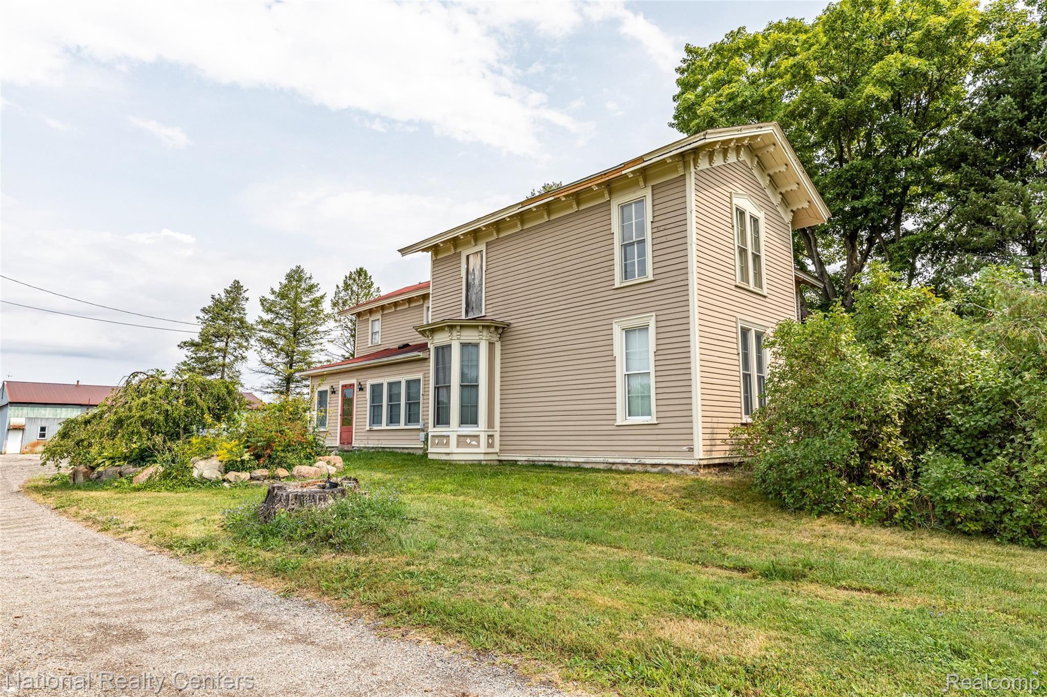 9155 Six Mile Road Northville, MI 48168 - Photo 1 of 40 1.Front