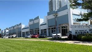 235 Riverside Drive Daytona Beach, FL 32117 - Photo 4 of 11 a view of a building with a yard