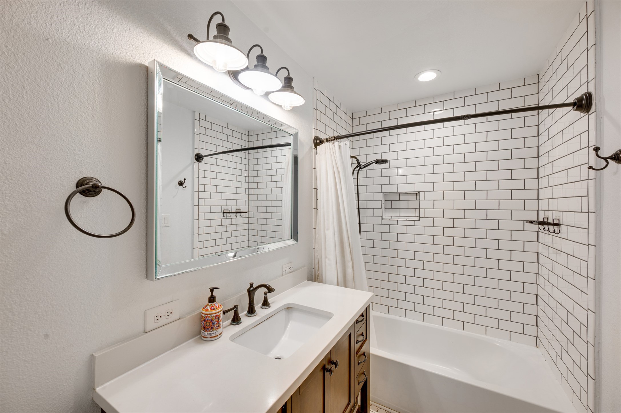 215 Perryman Road Lindale, TX 75771 - Photo 29 of 44 a bathroom with a sink vanity granite tub shower and a mirror