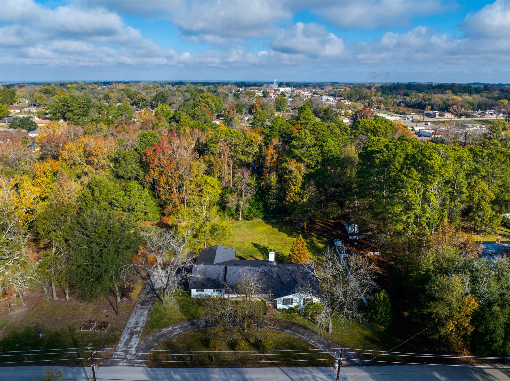 215 Perryman Road Lindale, TX 75771 - Photo 44 of 44 a view of a yard with wooden fence