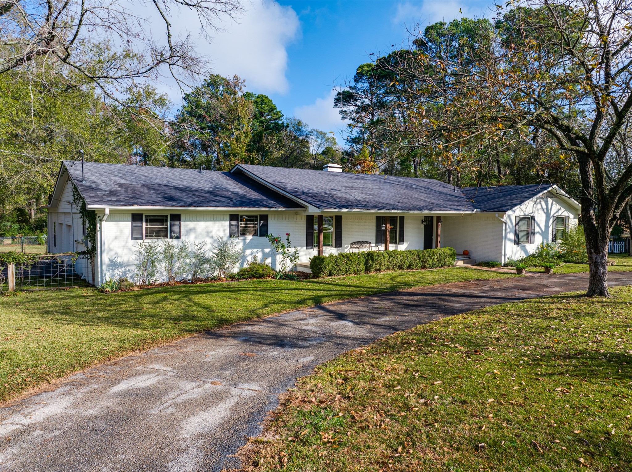 215 Perryman Road Lindale, TX 75771 - Photo 5 of 44 a front view of a house with garden