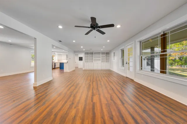 a kitchen with a stove a sink and a refrigerator