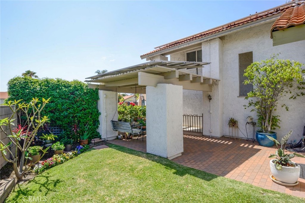 10424 Cartilla Court Rancho Cucamonga, CA 91737 - Photo 23 of 36 a front view of a house with garden
