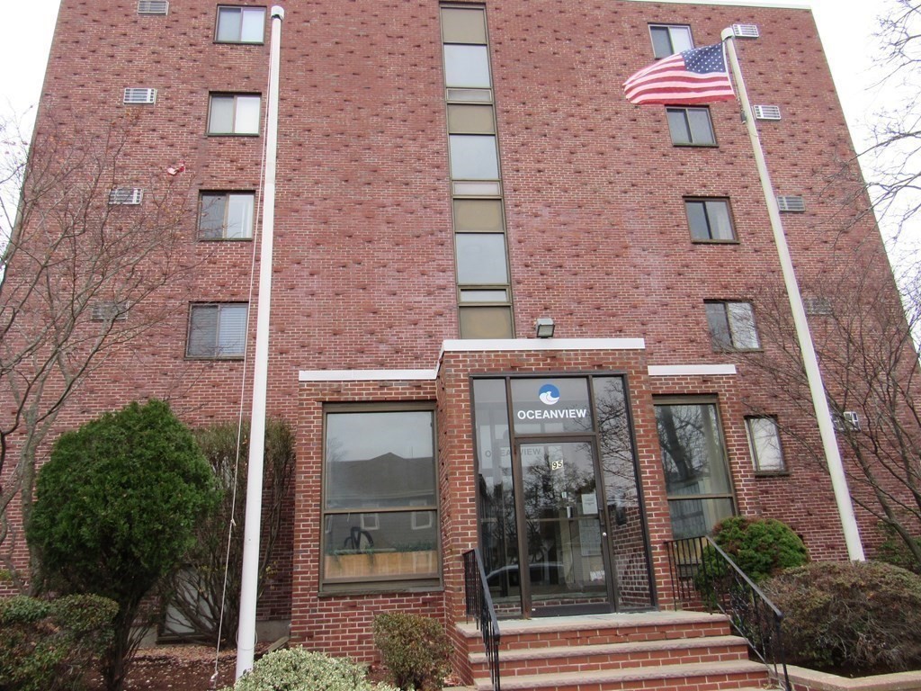 a front view of a multi story residential apartment building