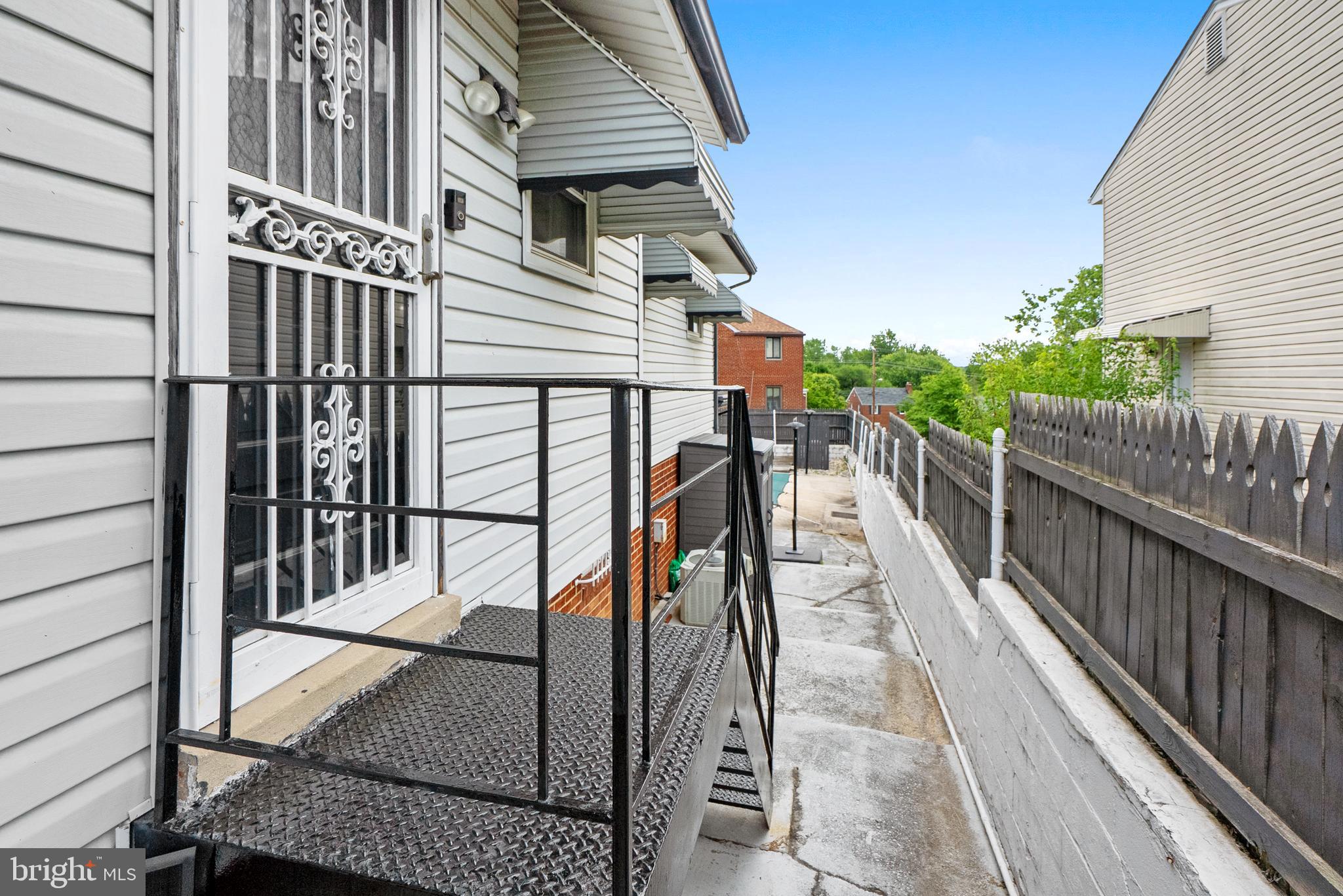 1201 Chillum Manor Road Hyattsville, MD 20783 - Photo 48 of 49 a balcony view with a backyard