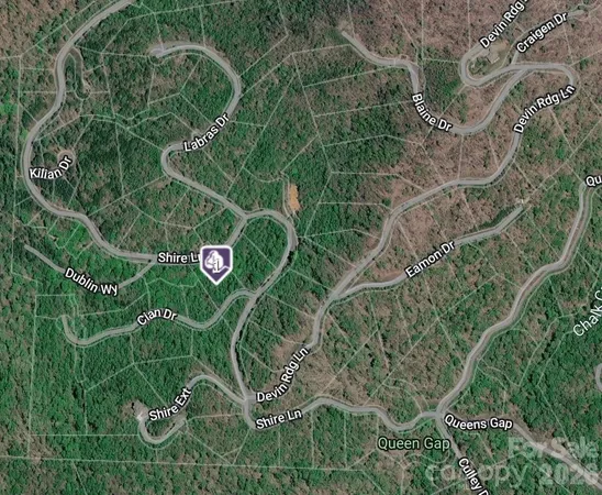 a sign that is on a tree