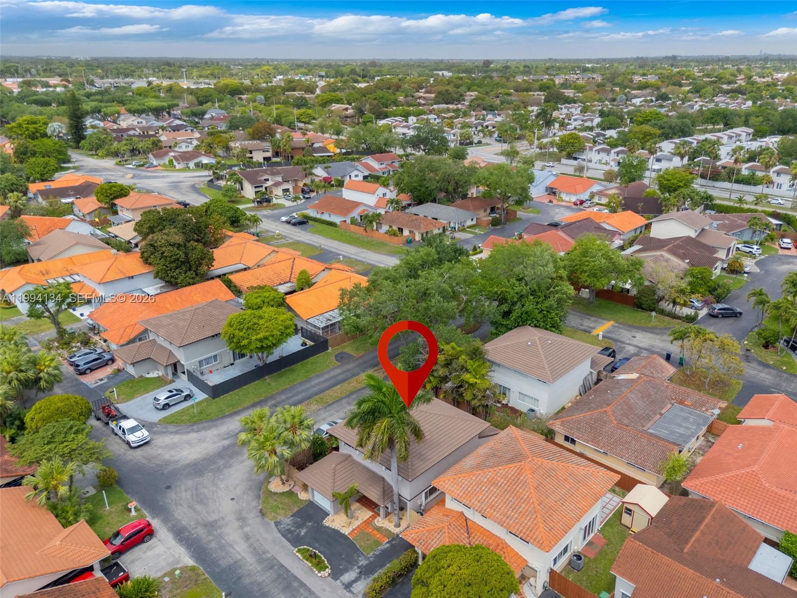 11319 Southwest 73rd Lane Miami, FL 33173 - Photo 33 of 43 an aerial view of residential houses with outdoor space and parking