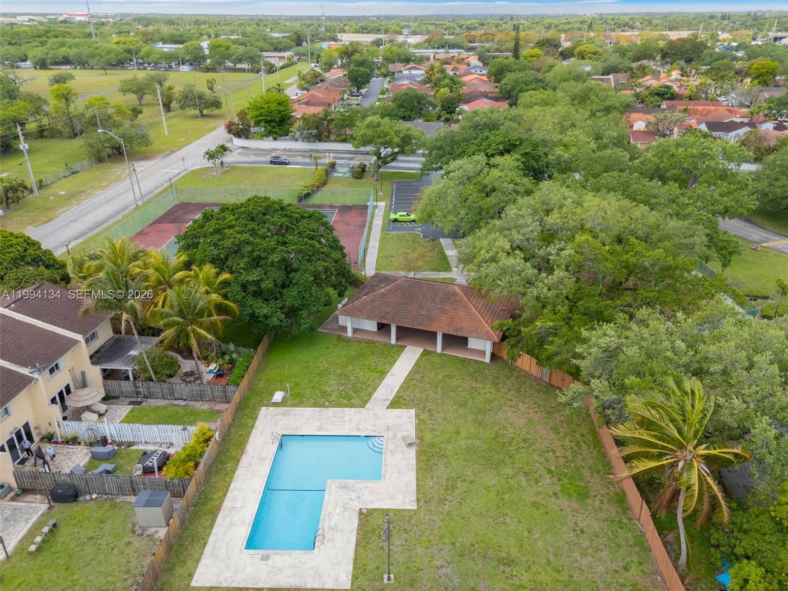 11319 Southwest 73rd Lane Miami, FL 33173 - Photo 41 of 43 an aerial view of residential houses with outdoor space and trees