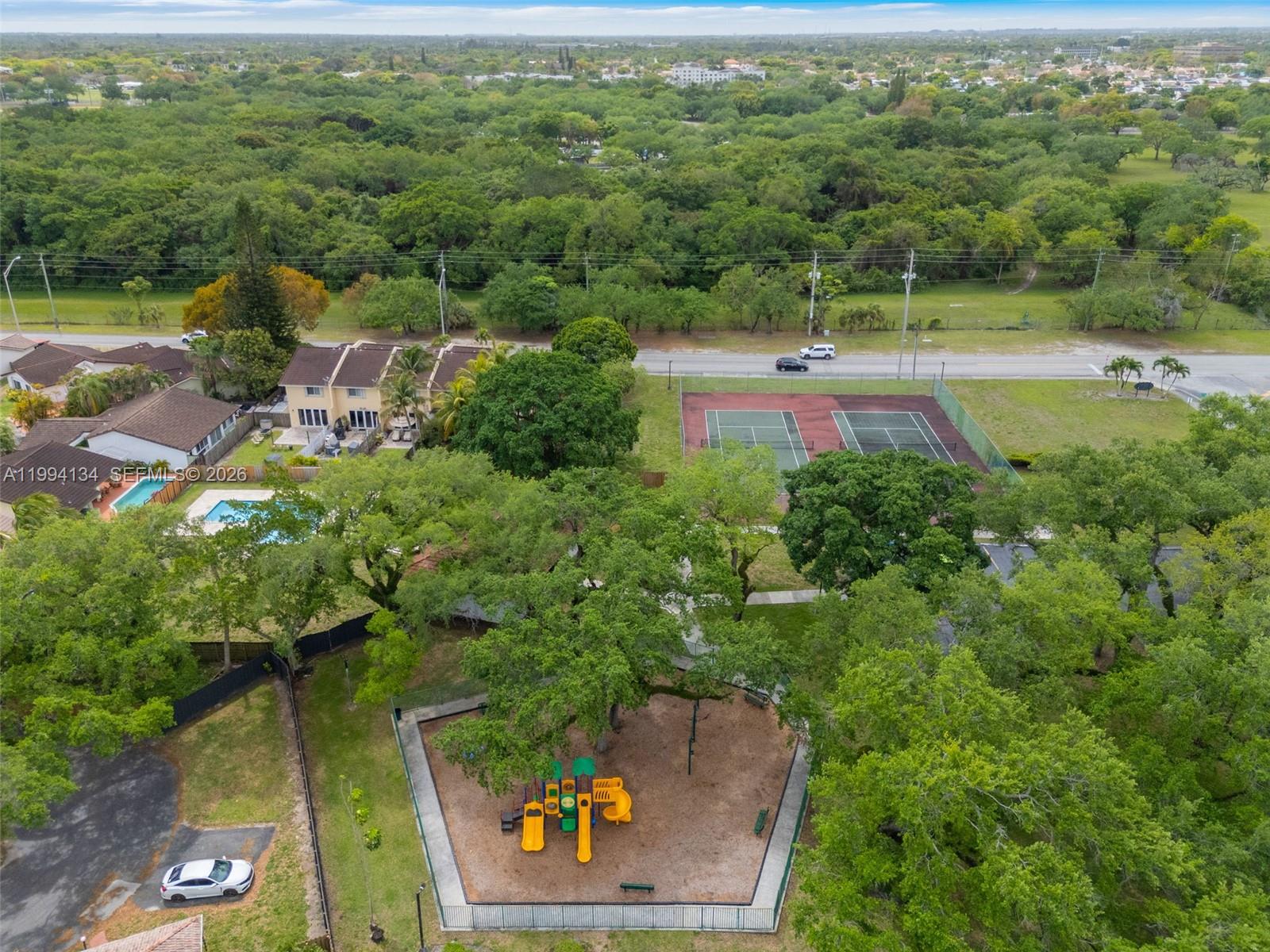11319 Southwest 73rd Lane Miami, FL 33173 - Photo 43 of 43 an aerial view of a house with pool outdoor seating and yard