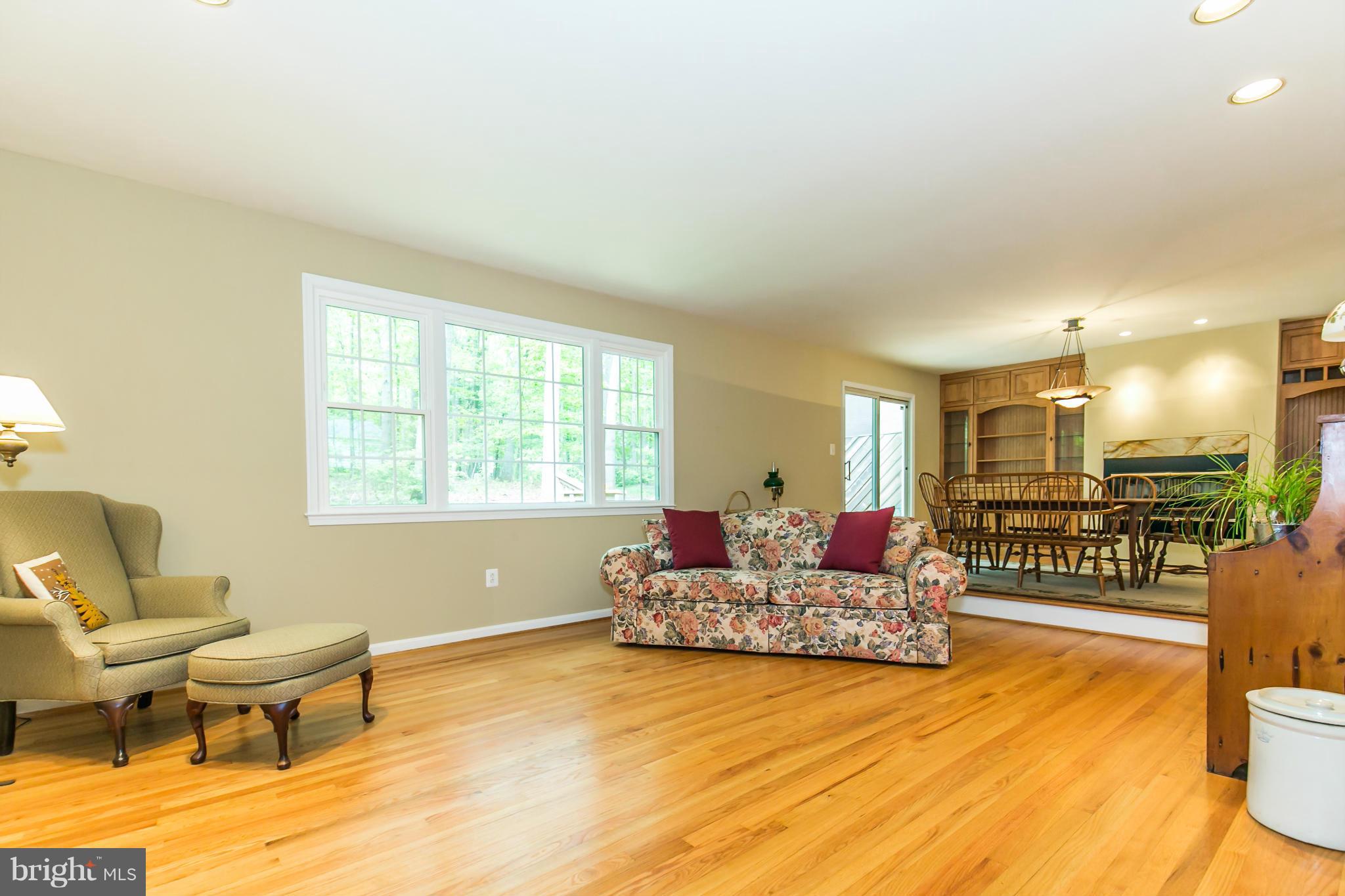 10722 Midsummer Drive Reston, VA 20191 - Photo 13 of 27 The living and dining rooms feature hardwoods.