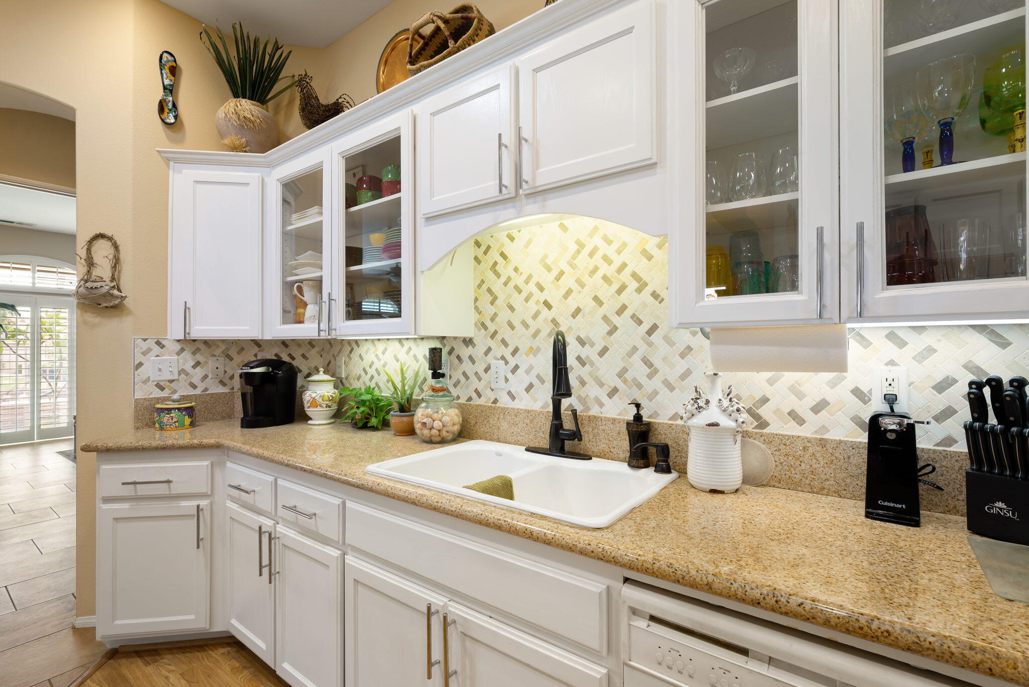 48908 Heifitz Drive Indio, CA 92201 - Photo 23 of 42 a kitchen with sink and cabinets