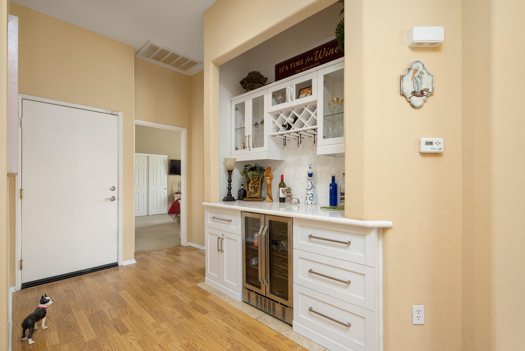 48908 Heifitz Drive Indio, CA 92201 - Photo 27 of 42 a kitchen with stainless steel appliances a refrigerator and cabinets