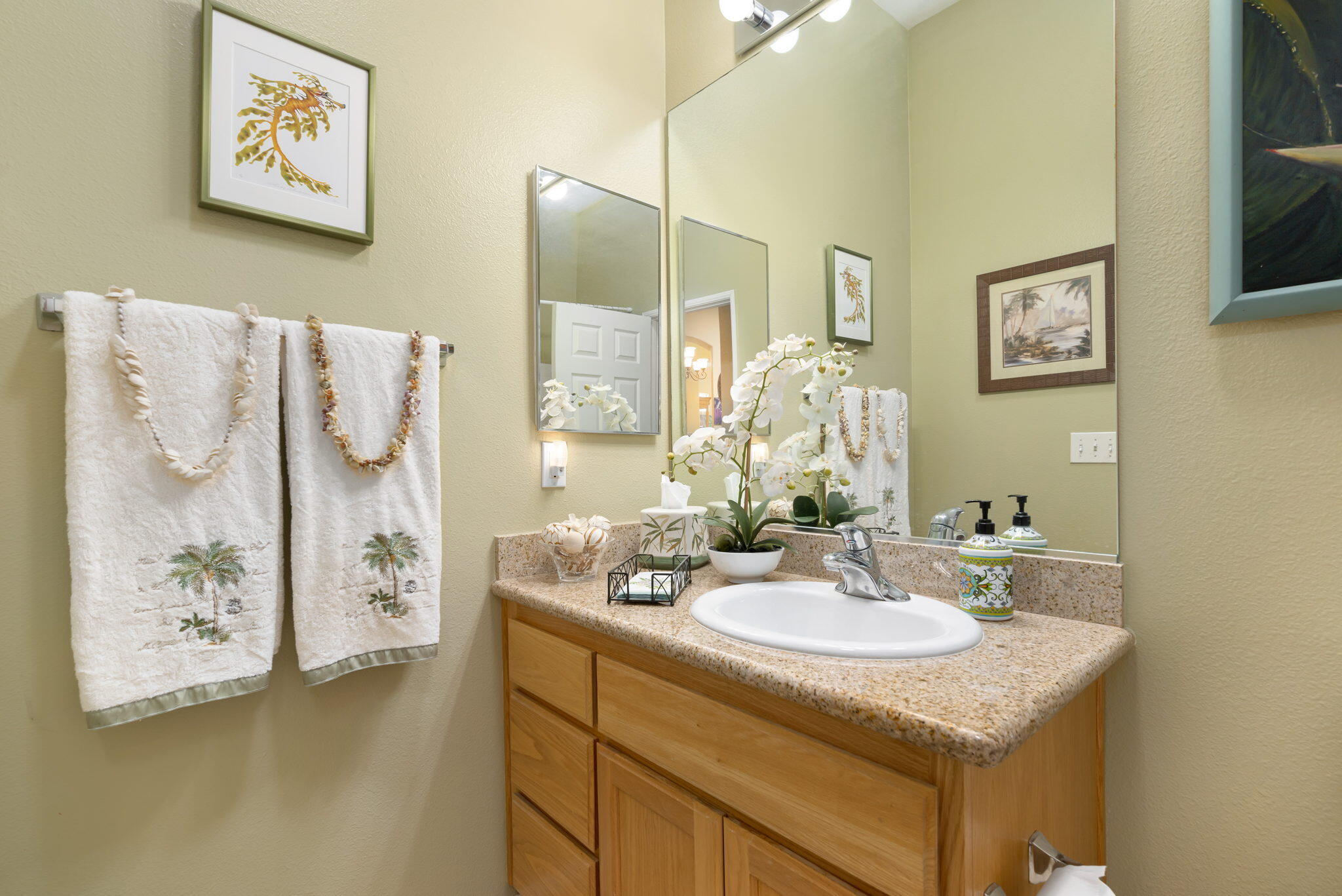 48908 Heifitz Drive Indio, CA 92201 - Photo 37 of 42 a bathroom with a sink and a mirror