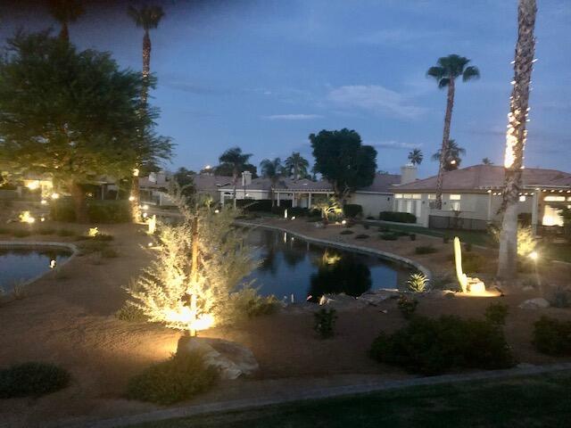 48908 Heifitz Drive Indio, CA 92201 - Photo 40 of 42 a lake view with boat and palm trees