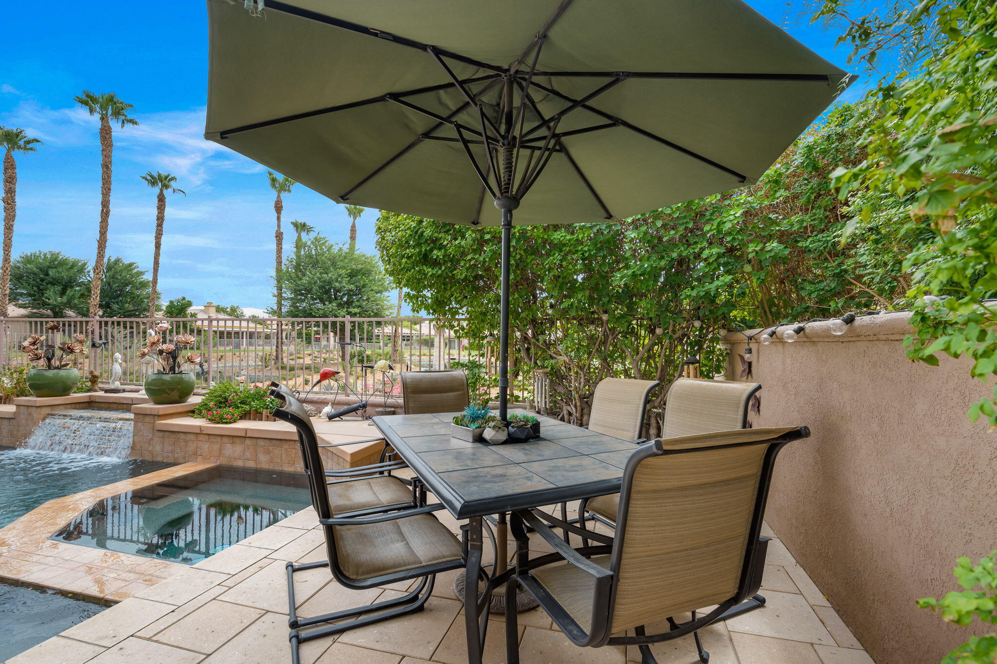 48908 Heifitz Drive Indio, CA 92201 - Photo 6 of 42 a view of an outdoor sitting area with furniture