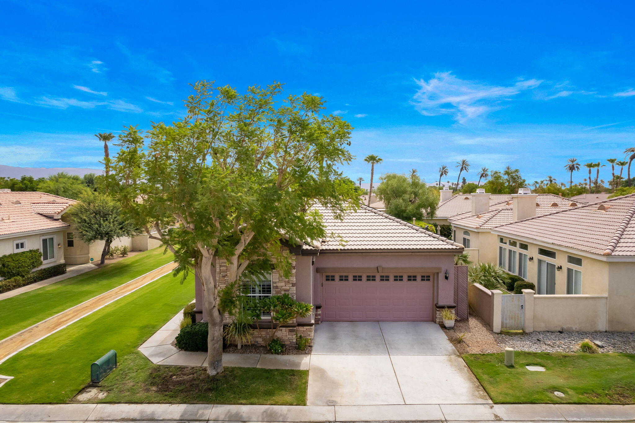 48908 Heifitz Drive Indio, CA 92201 - Photo 7 of 42 a view of a house with a yard