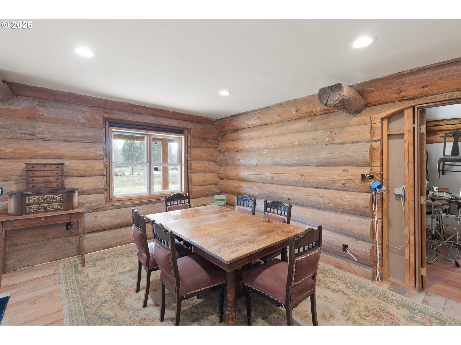 4420 Holland Loop Road Cave Junction, OR 97523 - Photo 12 of 46 a view of a dining room with furniture