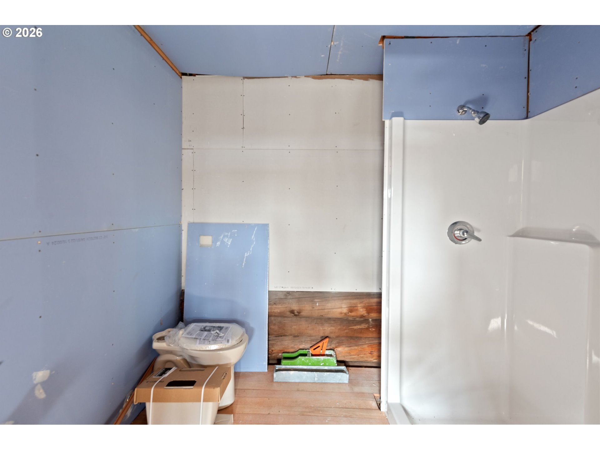 4420 Holland Loop Road Cave Junction, OR 97523 - Photo 26 of 46 a bathroom with a toilet and a shower