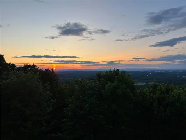 a view of lake and mountain