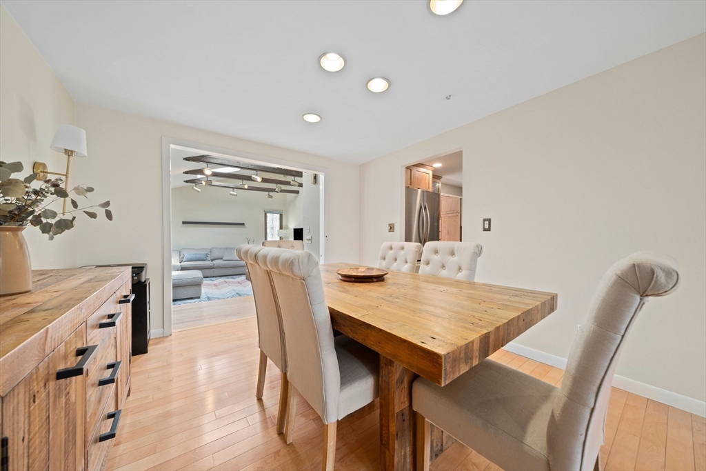 20 Condor Road Sharon, MA 02067 - Photo 13 of 41 a view of a dining room with furniture and wooden floor