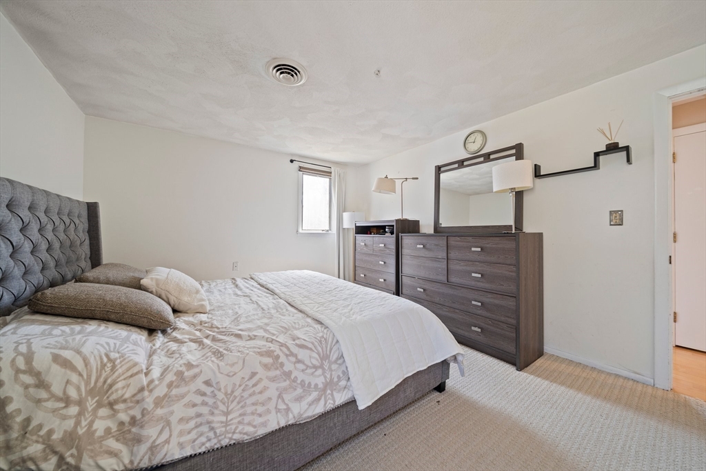 20 Condor Road Sharon, MA 02067 - Photo 18 of 41 a bedroom with a bed and dresser
