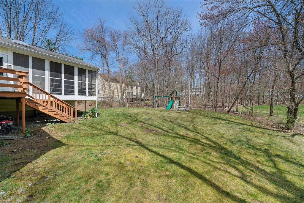 20 Condor Road Sharon, MA 02067 - Photo 30 of 41 a view of house with backyard and tree
