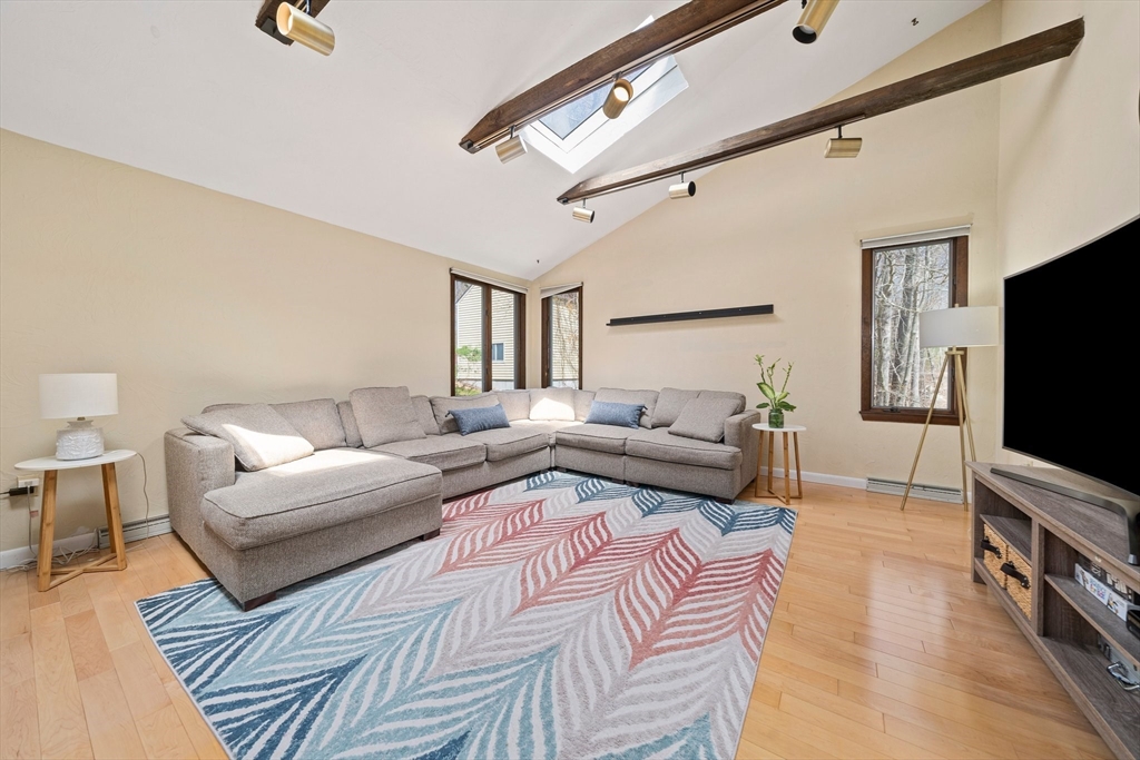 20 Condor Road Sharon, MA 02067 - Photo 5 of 41 a living room with furniture and a flat screen tv