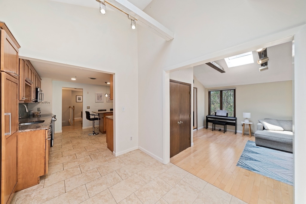 20 Condor Road Sharon, MA 02067 - Photo 10 of 41 a view of a living room kitchen and a sink
