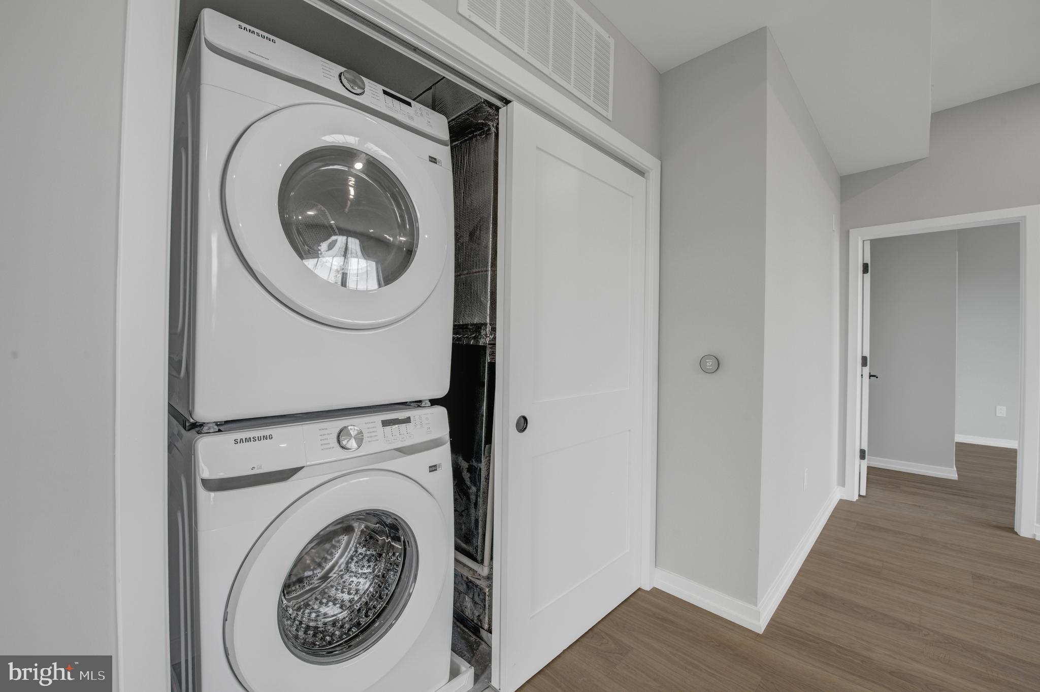 2445 Innovator Way, Unit 4I Philadelphia, PA 19146 - Photo 12 of 12 a view of a storage and utility room with washer and dryer