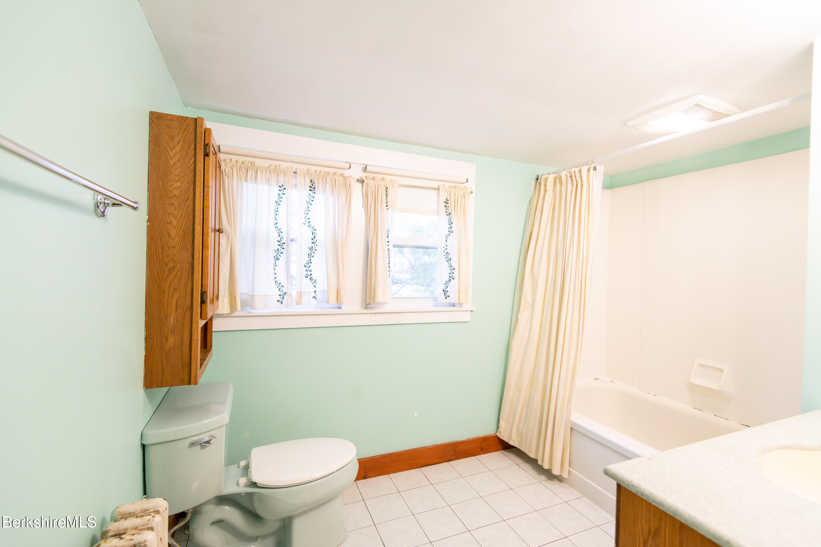 44 Main Street West Stockbridge, MA 01266 - Photo 14 of 28 a bathroom with a toilet a sink and a shower