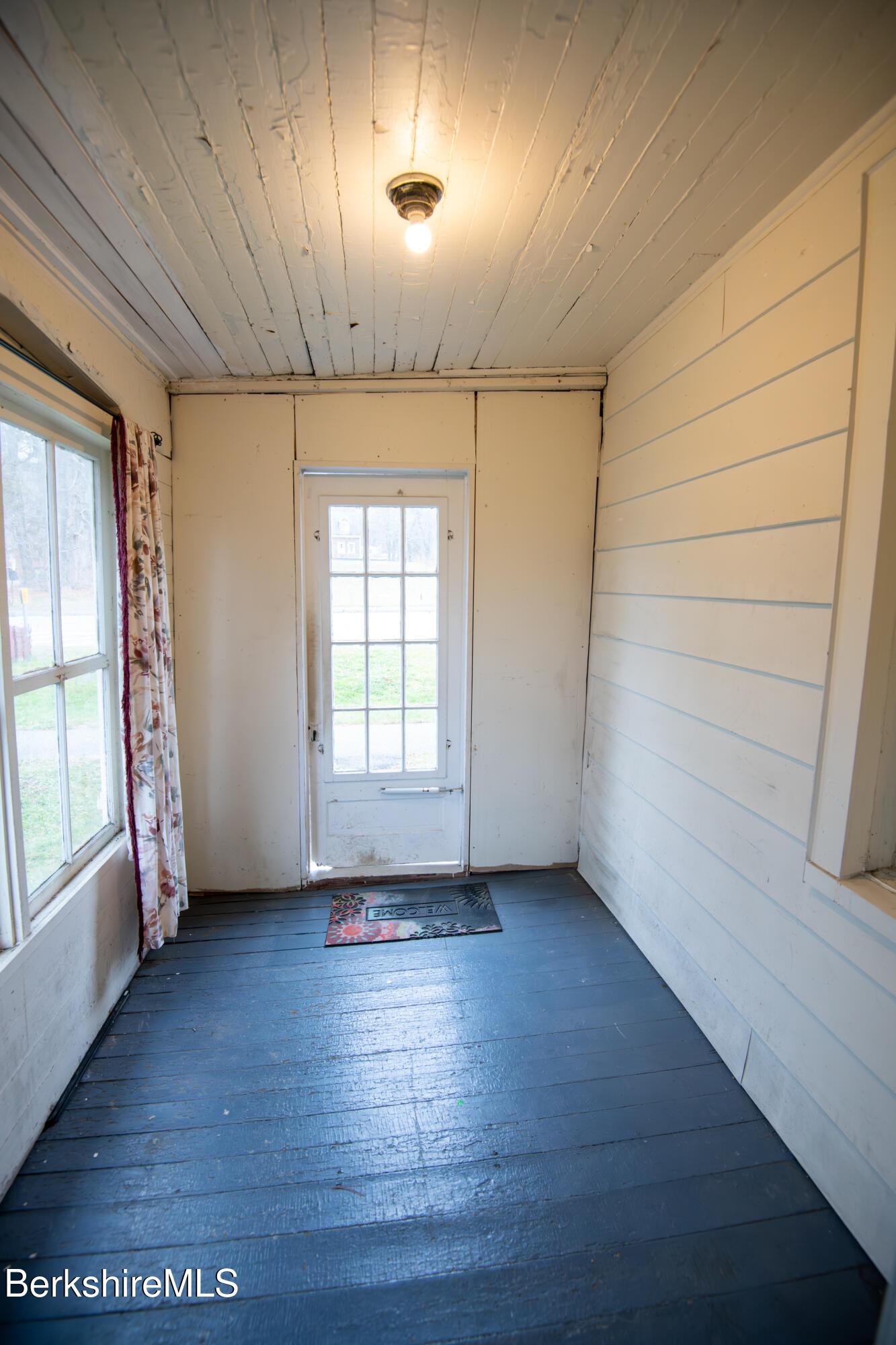 44 Main Street West Stockbridge, MA 01266 - Photo 16 of 28 an empty room with wooden floor and windows