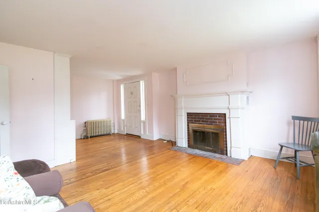a view of livingroom with furniture and fireplace