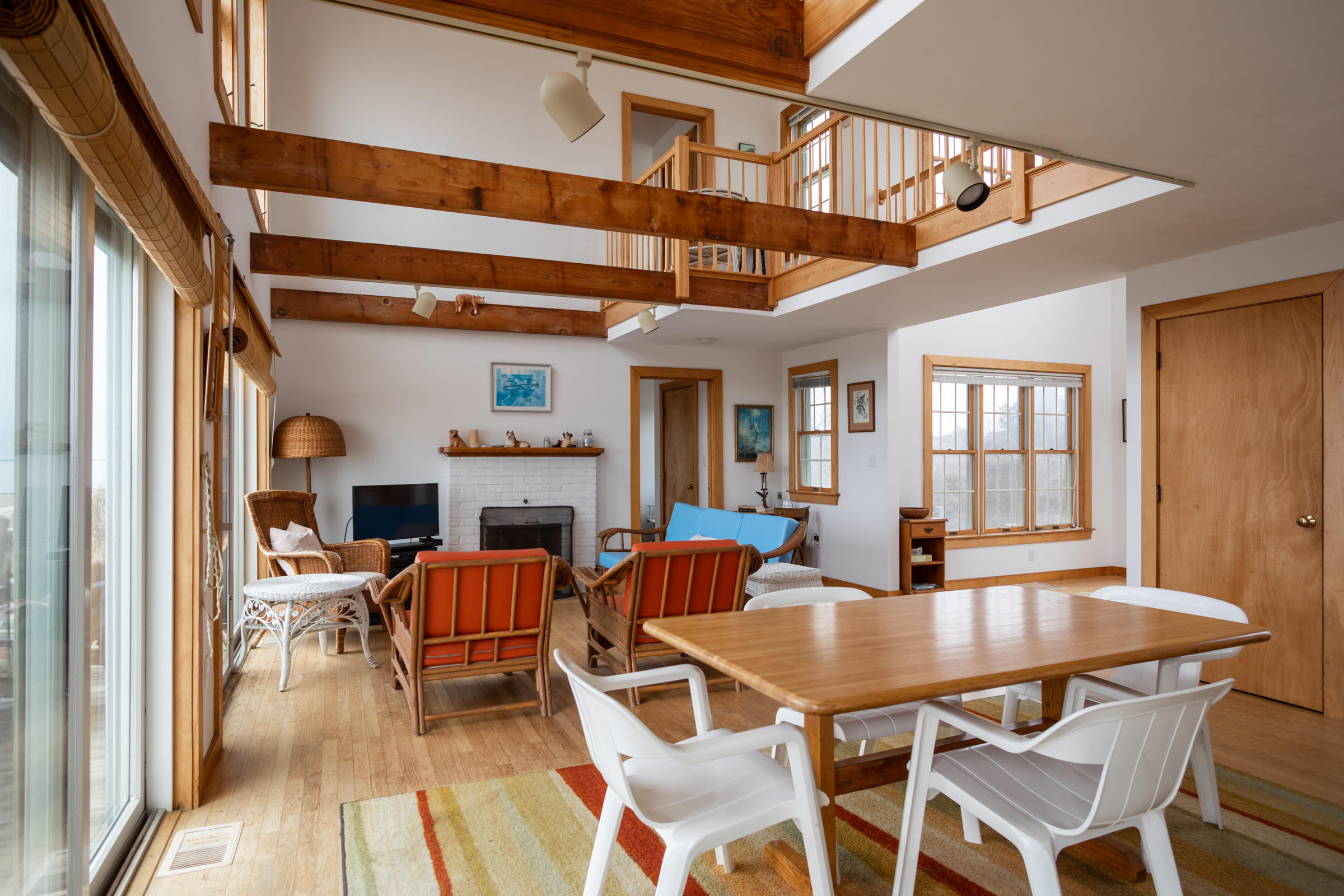 35 Bayberry Lane Eastham, MA 02642 - Photo 13 of 42 a dining room with furniture and wooden floor